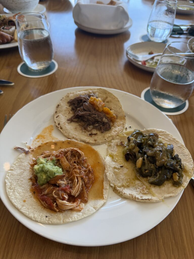 Gluten-free taco plate with carnitas, chicken, and mushroom at an all inclusive resort